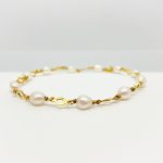 Pulsera de oro con perlas de agua dulce